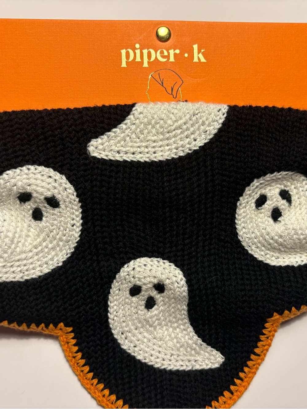 piper·k Black Knit Bandana with White Ghosts and Orange Trim
